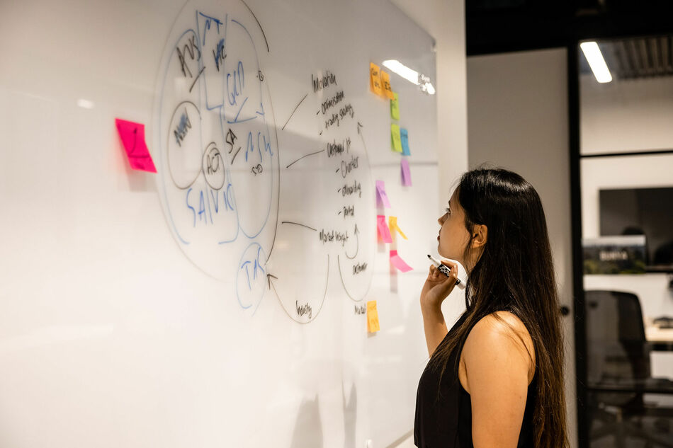 Woman drawing on the board