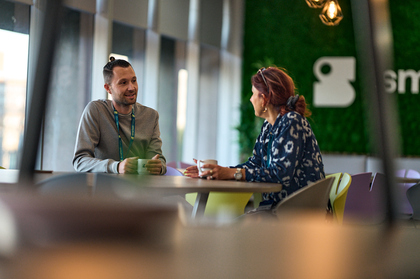 Two colleagues talking